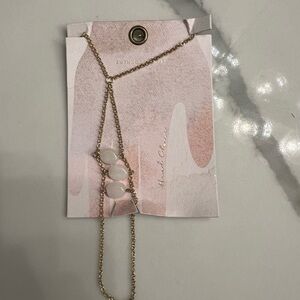 NWT: Anthropologie gold hand chain bracelet.
